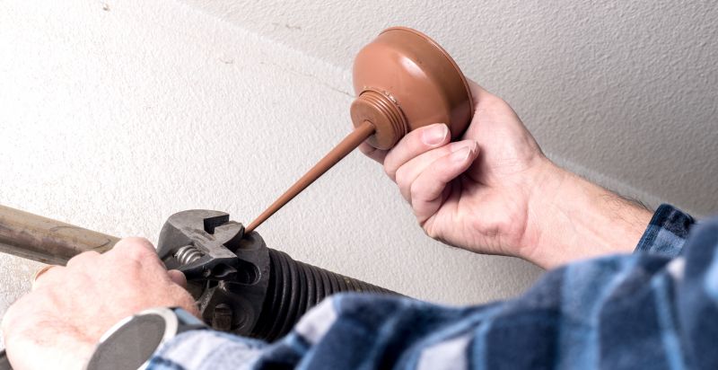 Garage Door Spring Repair And Replacement
